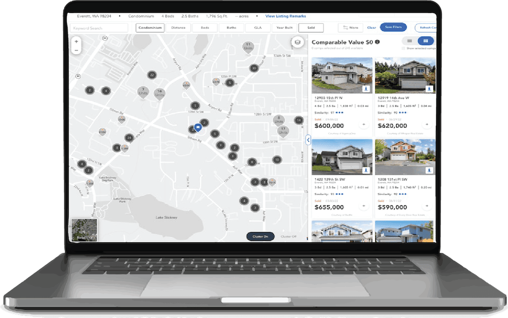 Laptop showing real estate map and listings