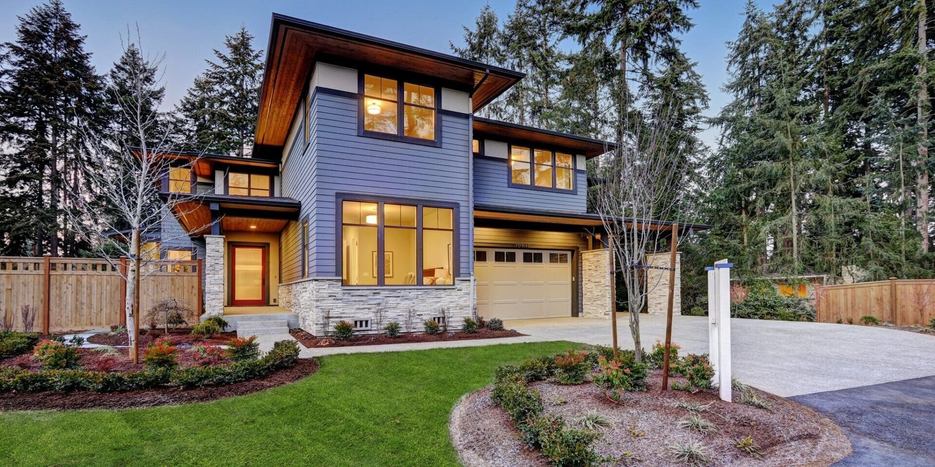 Modern two-story house with landscaped yard